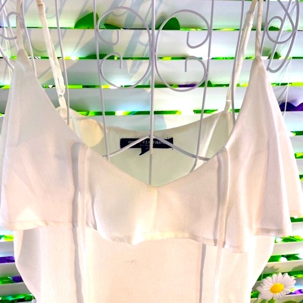 One Heart Clothing white ruffle boho top with tassels
